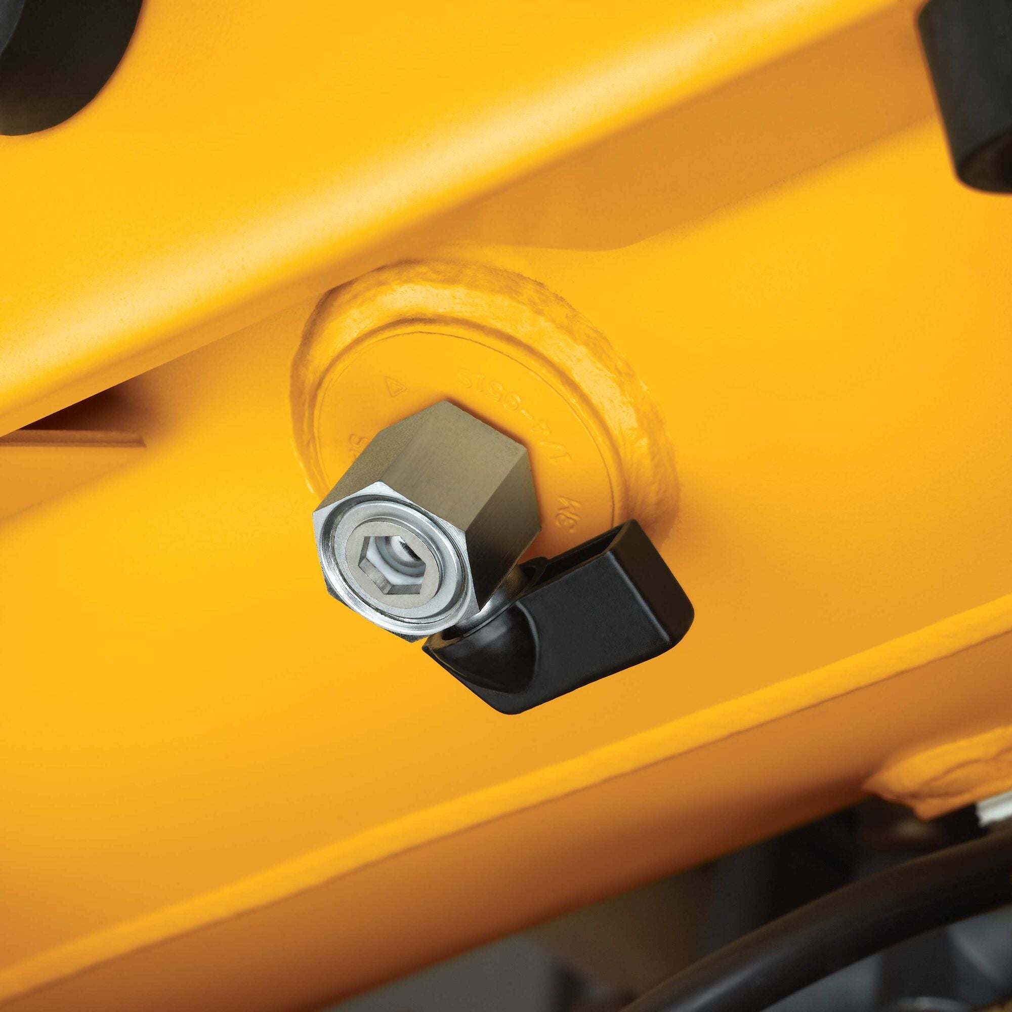 Close-up of the tank drain valve on the DeWalt 4.5 gallon air compressor