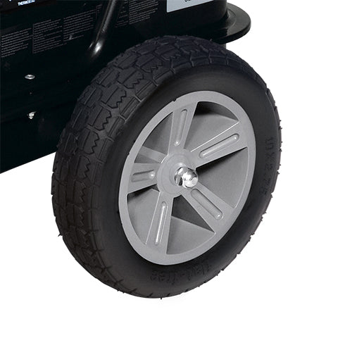 Close-up of a pneumatic wheel on the cart of the Dyna-Glo Delux 220,000 BTU heater