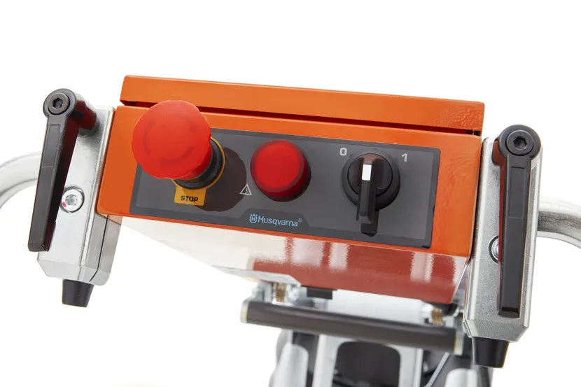 Close-up of the Husqvarna PG 280 control panel with its stop button and switch