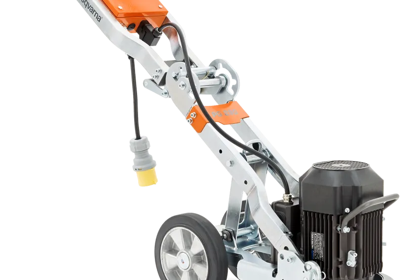 Husqvarna PG 280 floor grinder seen from the handle side, with the transport wheel
